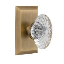 Nostalgic Warehouse Studio Plate with Oval Fluted Crystal Knob Antique Brass 
