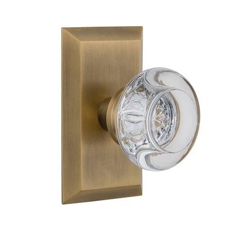 Nostalgic Warehouse Studio Plate with Round Clear Crystal Knob Antique Brass 