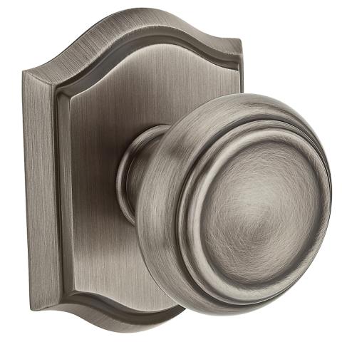Baldwin Reserve Traditional Knob shown with Arch Rose in Matte Antique Nickel b 