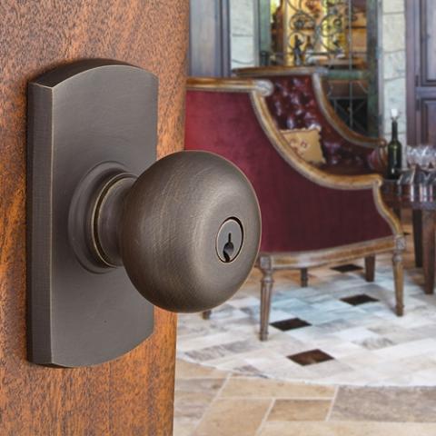 Emtek Winchester Keyed Entry Door Knob with #4 Rose Medium Bronze Patina (MB)
